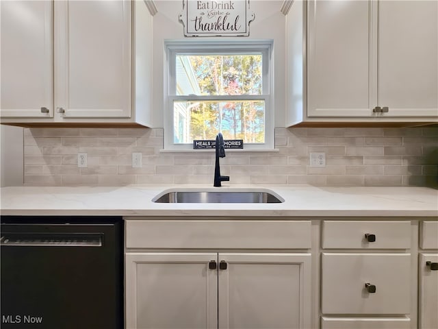 kitchen featuring sink, dishwasher, light stone countertops, decorative backsplash, and white cabinets