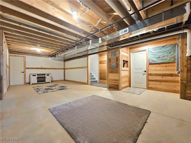 basement featuring heating unit