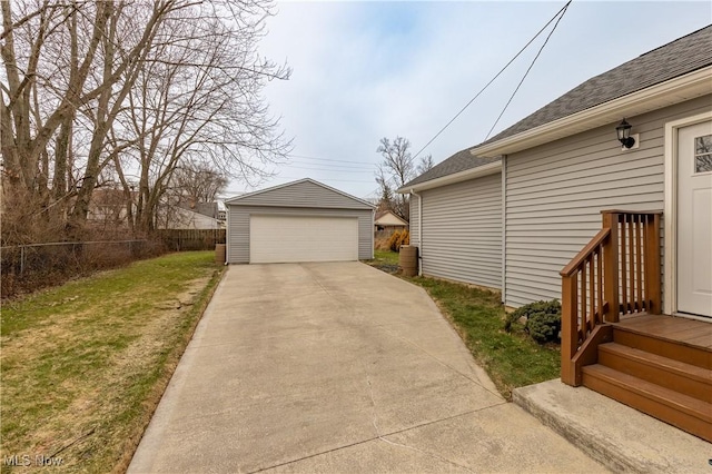 garage featuring a yard