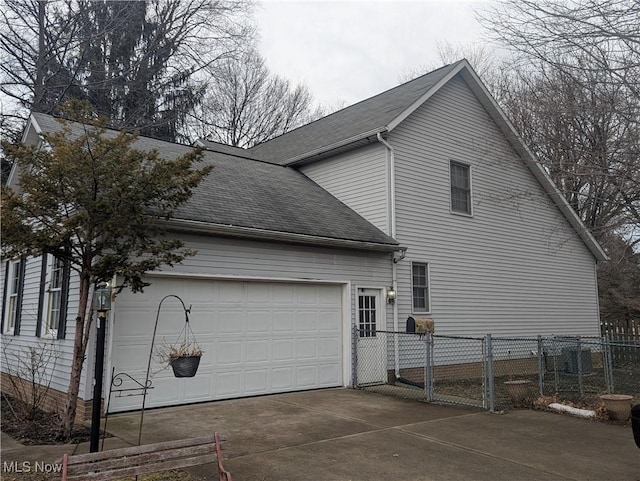 view of home's exterior with a garage