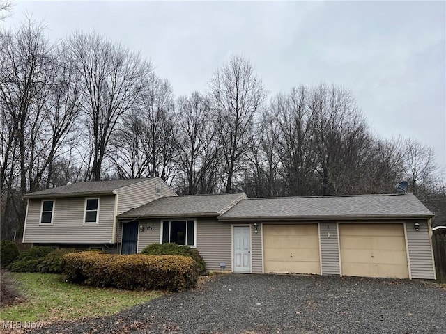 split level home featuring a garage