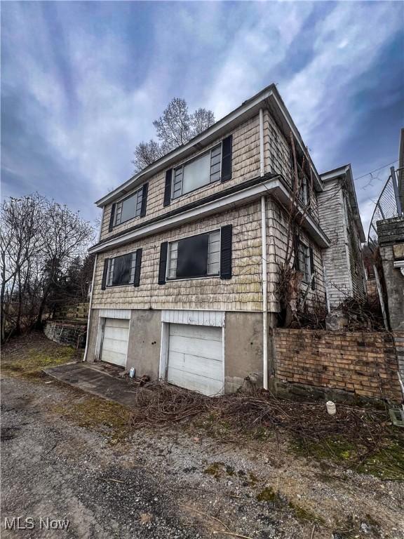 view of home's exterior with a garage