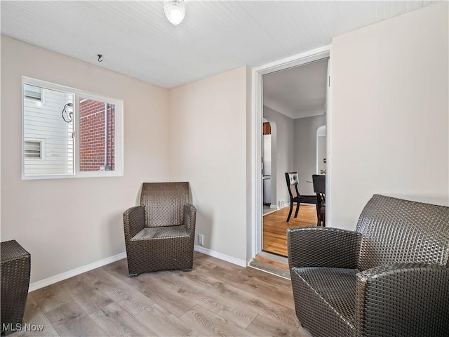 living area featuring light hardwood / wood-style floors