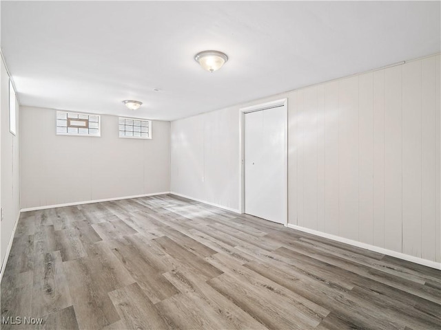 basement featuring light hardwood / wood-style flooring