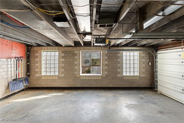 garage featuring a garage door opener