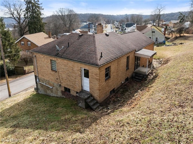 exterior space with a yard