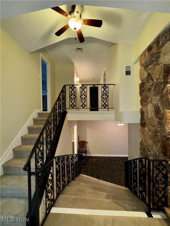 staircase with ceiling fan