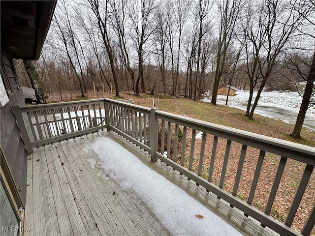 view of snow covered deck