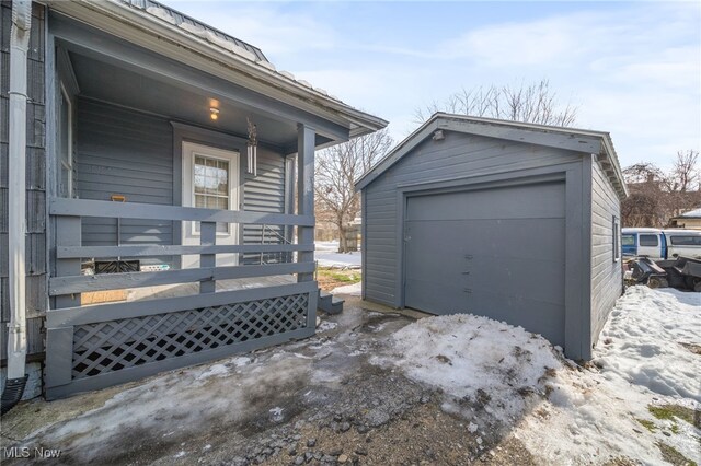 view of snow covered garage