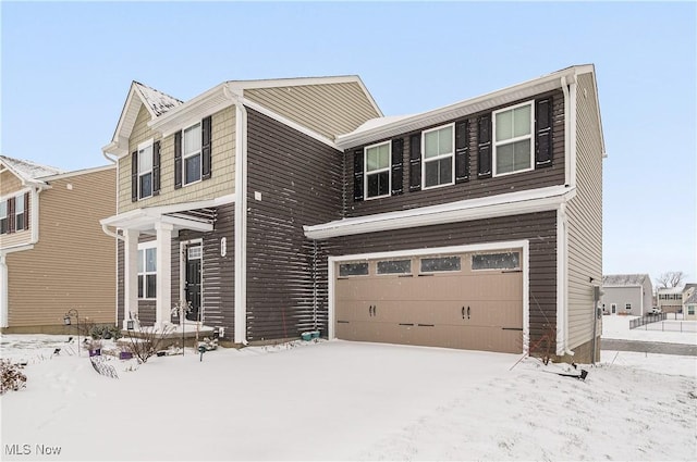 view of front of property with a garage