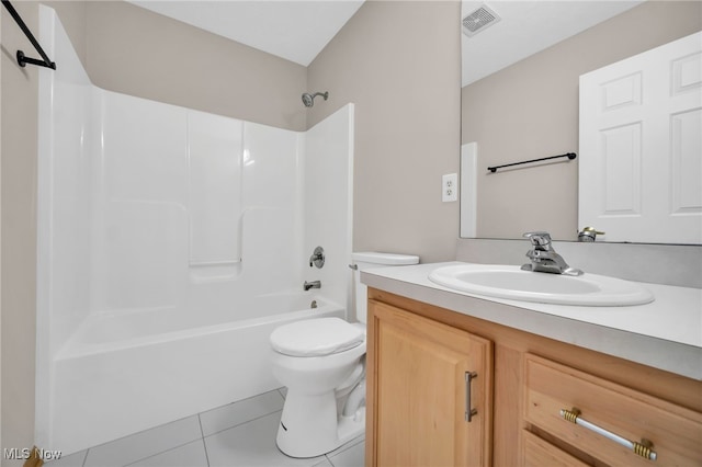 full bathroom featuring vanity, toilet, bathing tub / shower combination, and tile patterned flooring