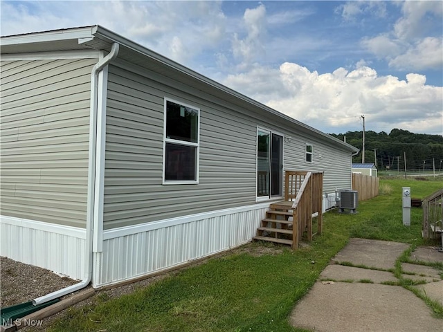 14000 Lincoln St SE, Minerva, OH 44657 - view of home's exterior with a cooling unit