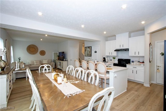 dining space featuring light hardwood / wood-style flooring