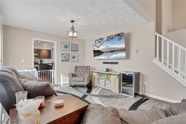 living room featuring a chandelier