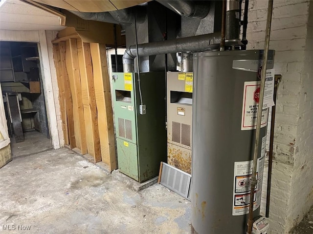 utility room with gas water heater