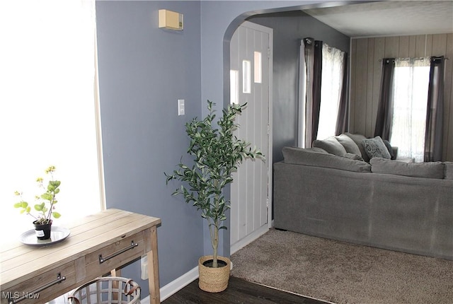 entryway with dark wood-type flooring