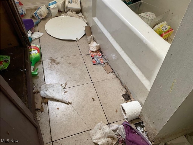 bathroom with tile patterned floors