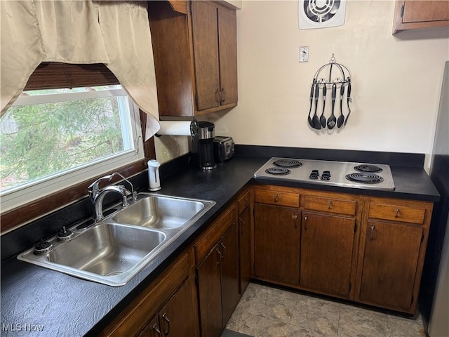 kitchen with sink and gas stovetop