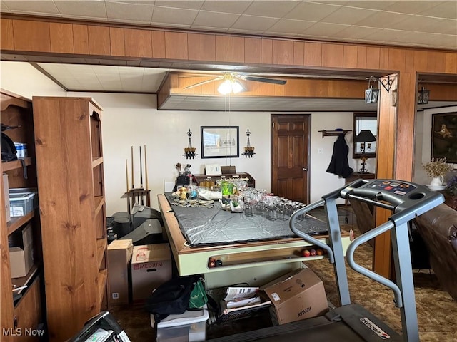 interior space featuring wood walls