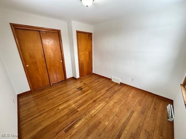 unfurnished bedroom featuring light hardwood / wood-style floors