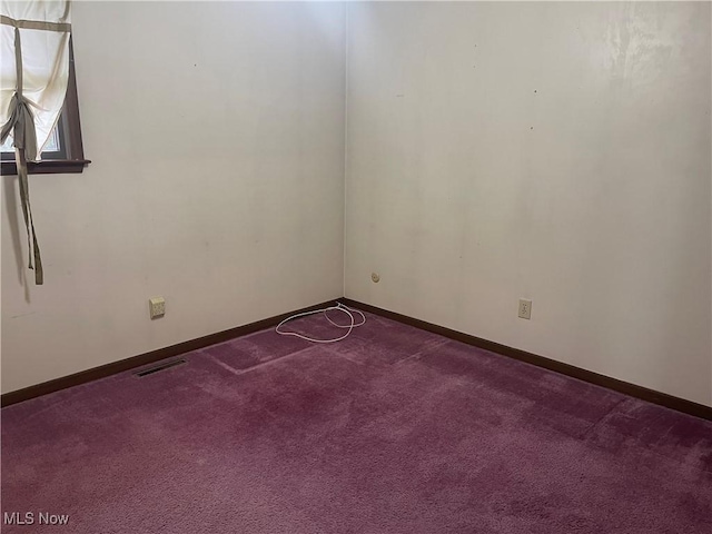 empty room with carpet floors