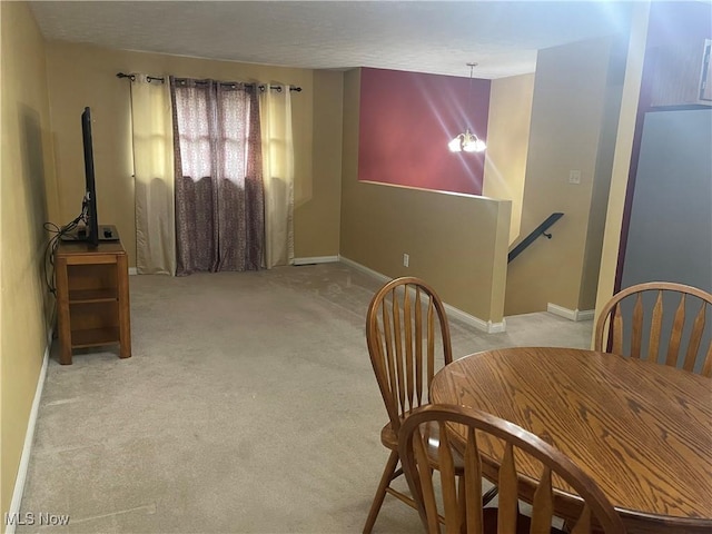 view of carpeted dining room