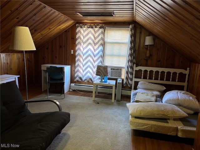 interior space featuring vaulted ceiling, wood walls, carpet flooring, a baseboard heating unit, and wooden ceiling