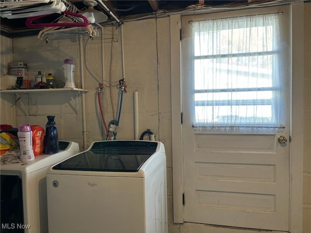 laundry room with washing machine and dryer