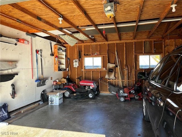 garage featuring a garage door opener