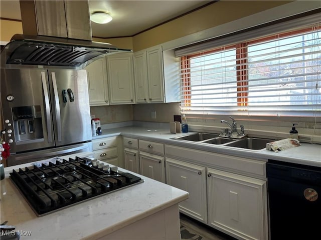 kitchen with island exhaust hood, sink, white cabinets, and black appliances