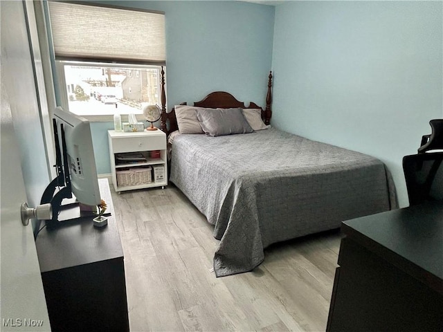 bedroom featuring light hardwood / wood-style flooring