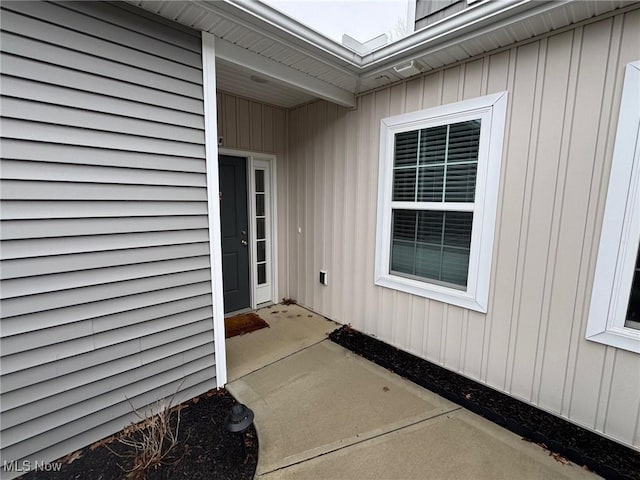 doorway to property featuring a patio area