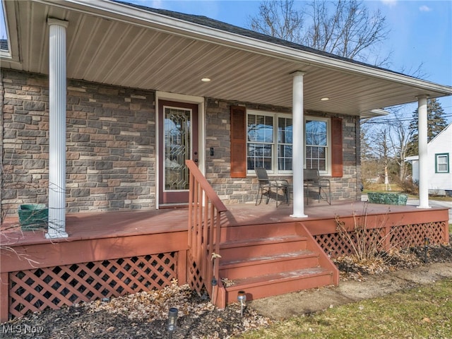 wooden deck featuring covered porch