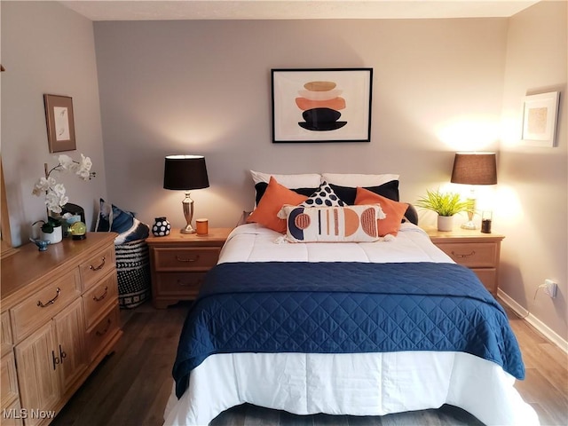 bedroom featuring dark hardwood / wood-style floors