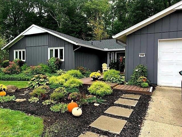 view of property exterior with a garage