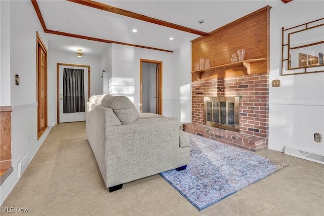 living room featuring a fireplace, beamed ceiling, and light tile patterned flooring