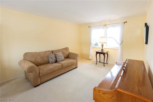 living room with light colored carpet and ornamental molding