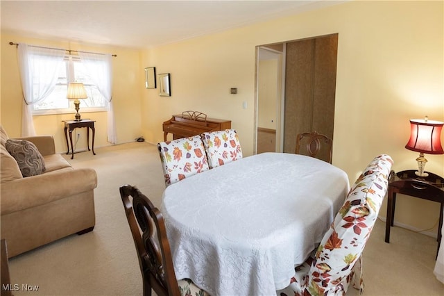 view of carpeted dining space