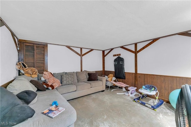 living room featuring wooden walls