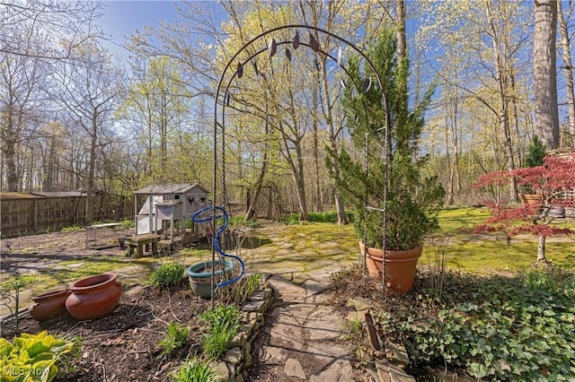 30700 Ainsworth Dr, Pepper Pike, OH 44124 - view of yard featuring fence, an outdoor structure, and a storage unit