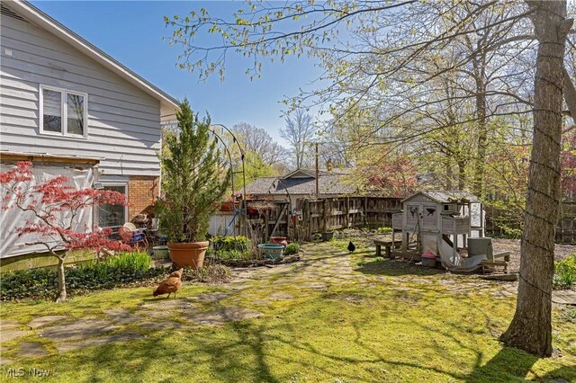 30700 Ainsworth Dr, Pepper Pike, OH 44124 - view of yard featuring fence and an outdoor structure