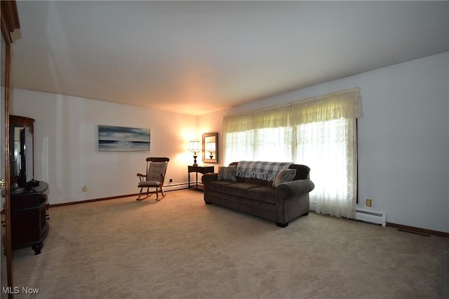 living room with carpet flooring and baseboard heating