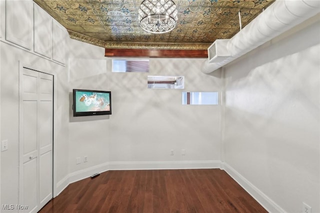 basement featuring dark wood-type flooring