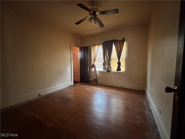 1245 E 137th St, East Cleveland, OH 44112 - unfurnished room featuring ceiling fan, baseboards, and hardwood / wood-style floors