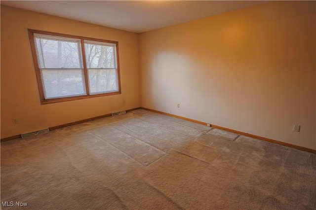 view of carpeted spare room