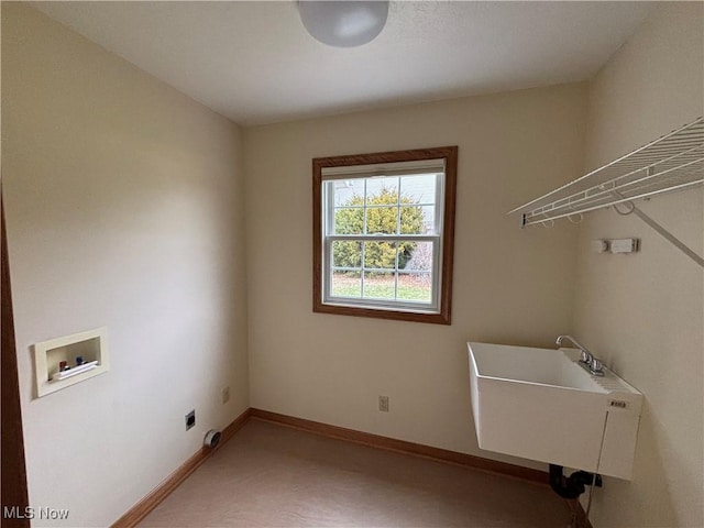 laundry room featuring electric dryer hookup, sink, and washer hookup