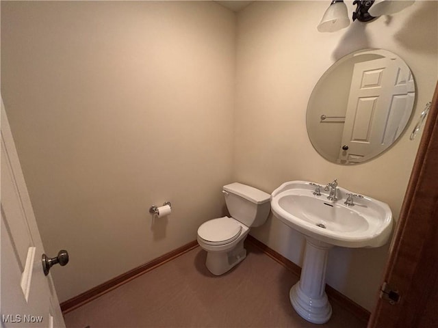 bathroom featuring toilet