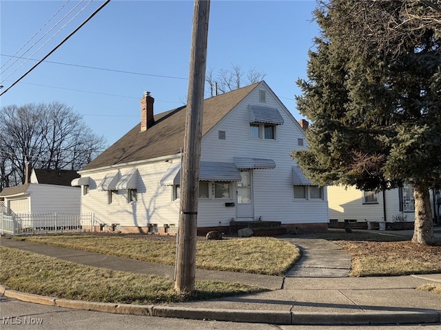 view of home's exterior featuring a yard