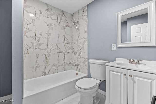 full bathroom with tiled shower / bath combo, vanity, and toilet