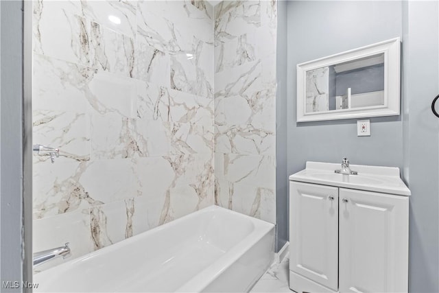 bathroom with vanity and shower / bathing tub combination